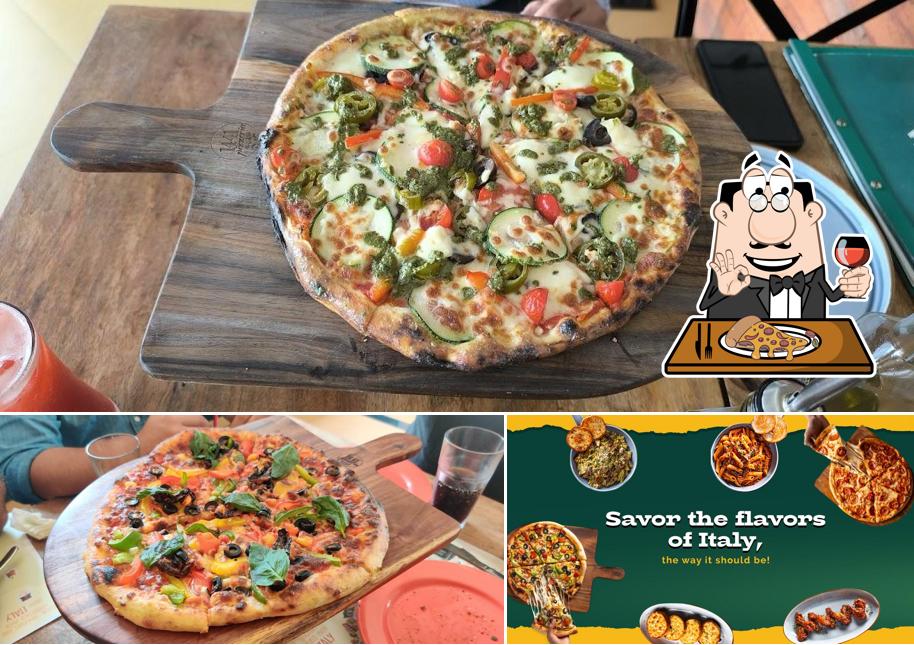 At 1441 Pizzeria Surat, you can enjoy pizza