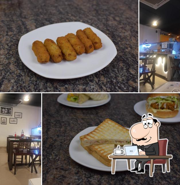 The interior of Cheezy Pizza's & Burgers