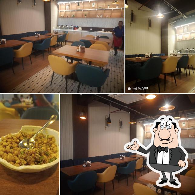 Take a seat at one of the tables at Salt and Vinegar - Best Restaurant in Balasore
