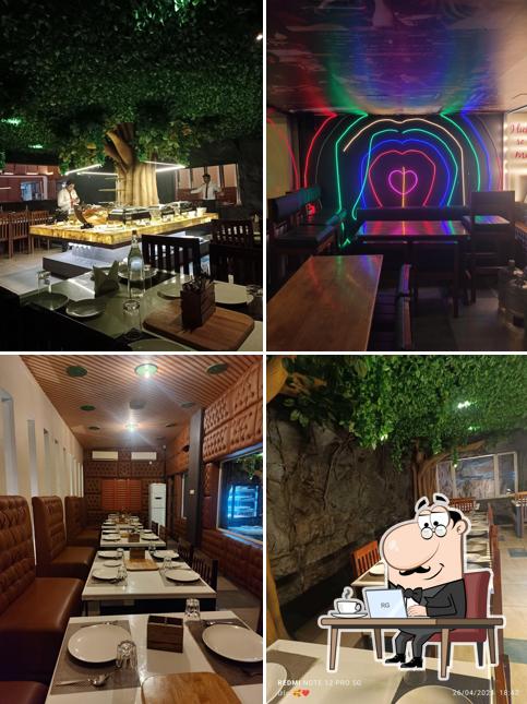 Take a seat at one of the tables at Sri Rayappas Restaurant