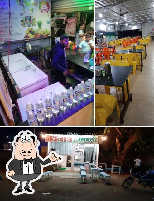 Take a seat at one of the tables at Hotel SAI WELCOME