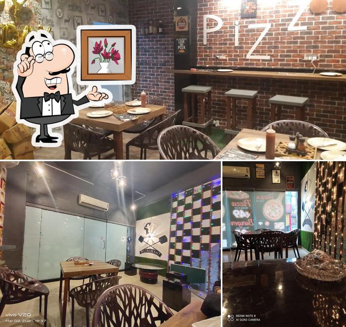 The picture of The Pizza Box’s interior and food
