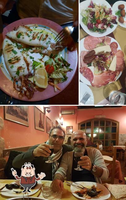 Questa è la immagine che raffigura la cibo e bancone da bar di La Scuderia