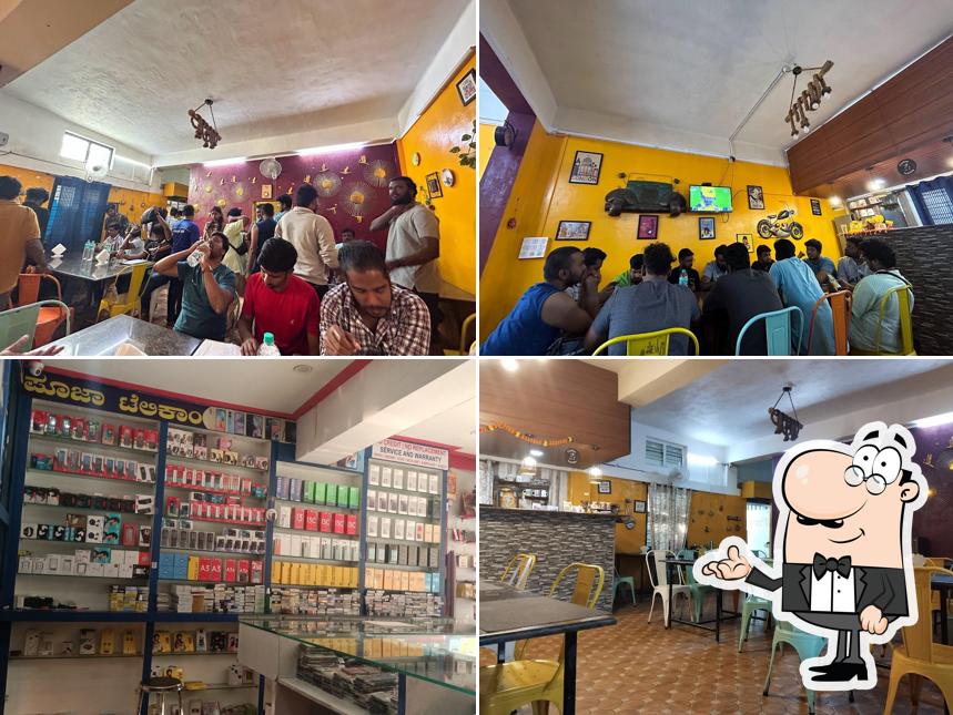 Take a seat at one of the tables at Banana Leaf Restaurant [Veg and non-veg]