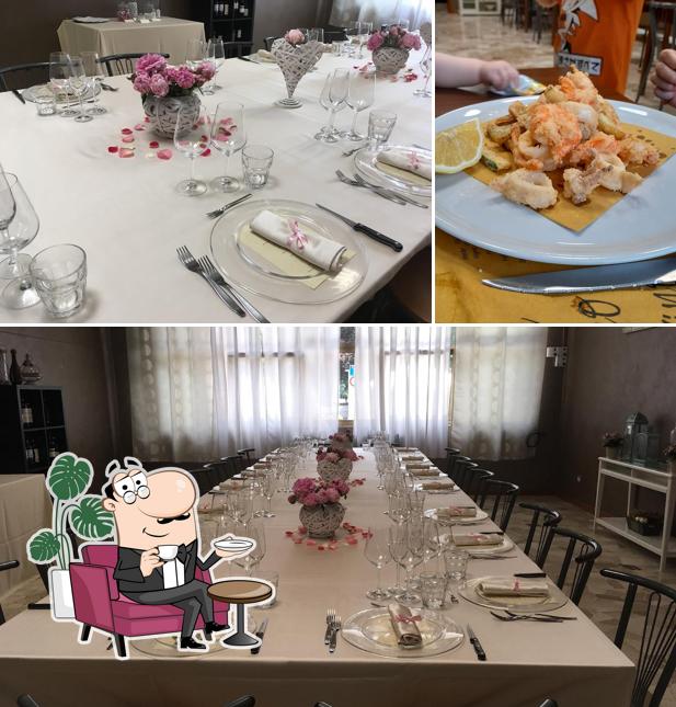 La interni e tavolo da pranzo del ristorante