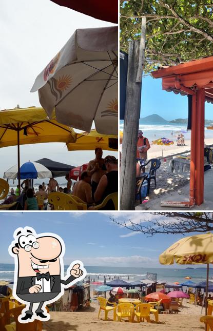 Sente em uma das mesas no Quiosque Mestre Deca