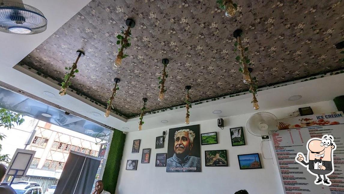 Check out how New Lassi Corner - Coffee Adda looks inside