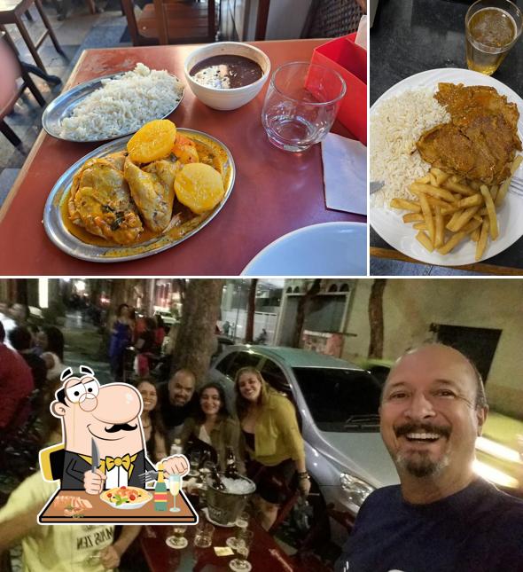 A imagem da comida e mesa de jantar a Social Lapa