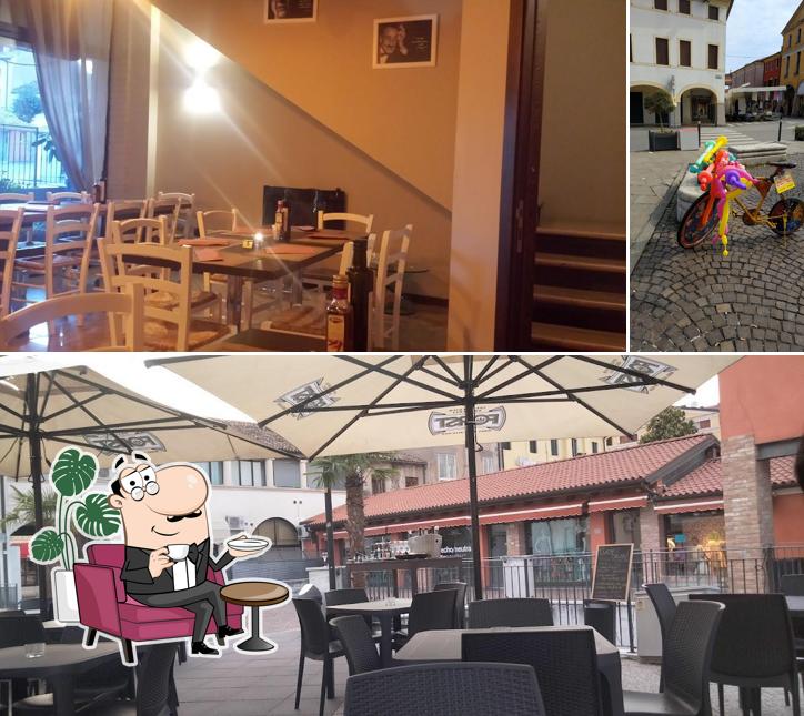 Tra le varie cose da Civico 8 Pizzeria birreria paninoteca si possono trovare la interni e esterno