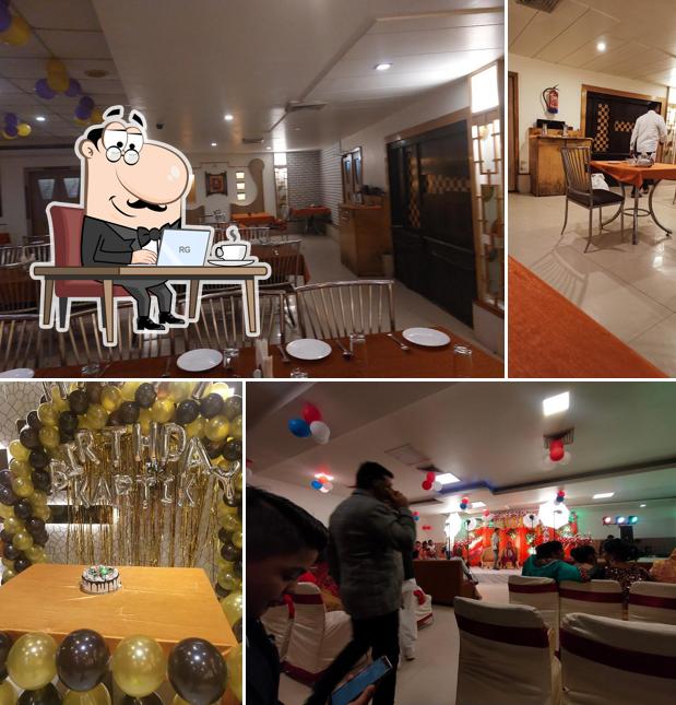 Take a seat at one of the tables at Hotel heera invitation mathura