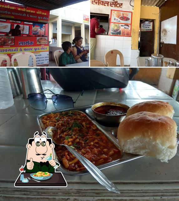 This is the picture showing food and interior at Sarthak General Stores & Snacks Center