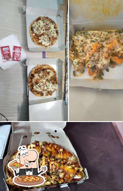 Get pizza at Brownie Bakers