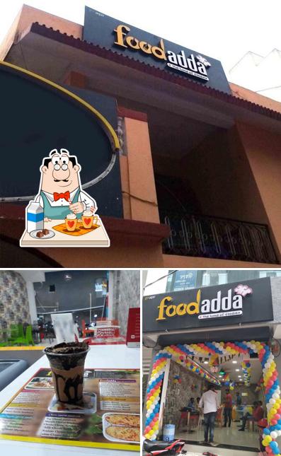 Enjoy a beverage at Food Adda