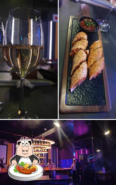 The image of Aura Restro Lounge’s food and interior