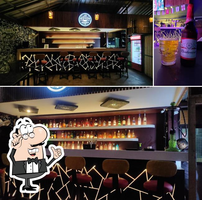 Take a seat at one of the tables at Darwin's Resto Pub