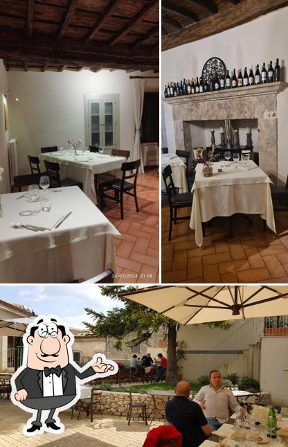Siediti a un tavolo di I giardini del borgo