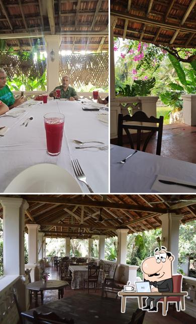 Take a seat at one of the tables at Palácio do Deão