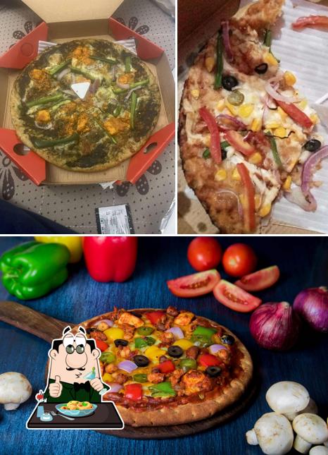 Take a look at the image displaying food and interior at Oven Story Pizza