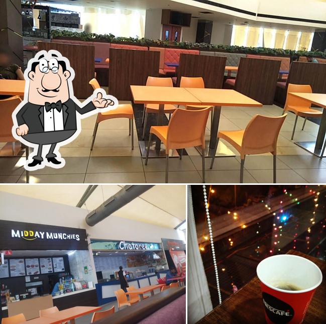 Take a look at the picture depicting interior and beverage at Midday Munchies