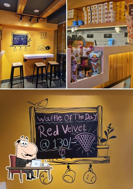 The image of interior and exterior at The Belgian Waffle Co