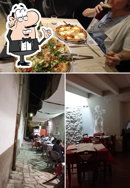 Tra le diverse cose da Il Canto Sesto - Pizza e Cucina Italiana si possono trovare la interni e cibo
