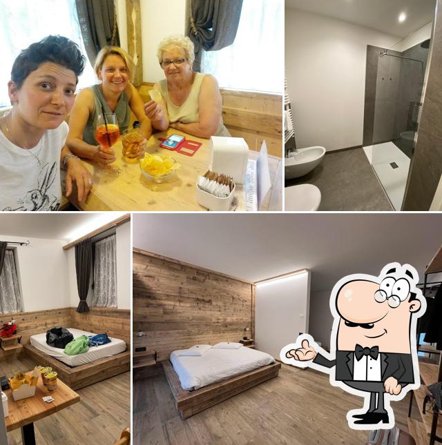 Siediti a un tavolo di Bed&Breakfast Bar La Coa
