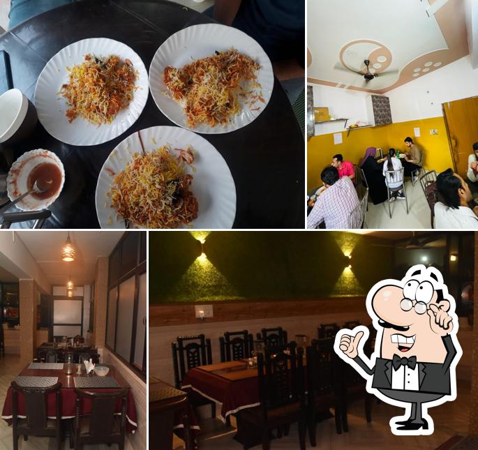 Take a seat at one of the tables at Deccan Biryani House