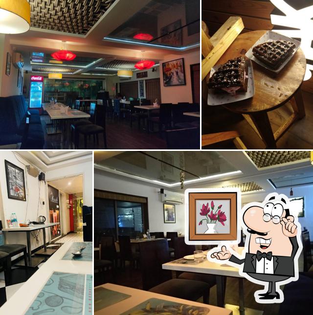 Take a seat at one of the tables at Shack Restaurant