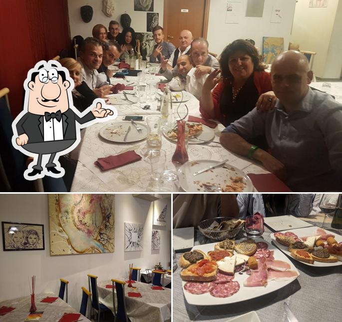 La interni e tavolo da pranzo del ristorante