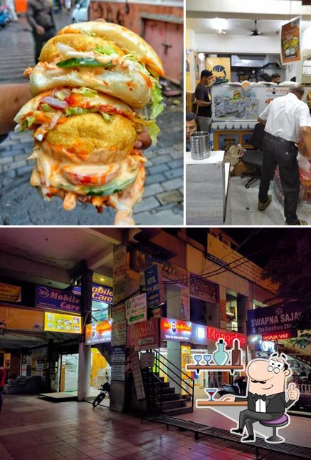 Take a seat at one of the tables at Jugaadi Adda Bopal