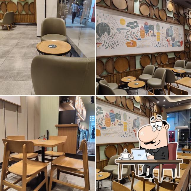 Take a seat at one of the tables at Starbucks