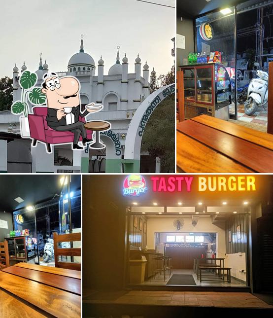 Take a seat at one of the tables at Tasty Burger