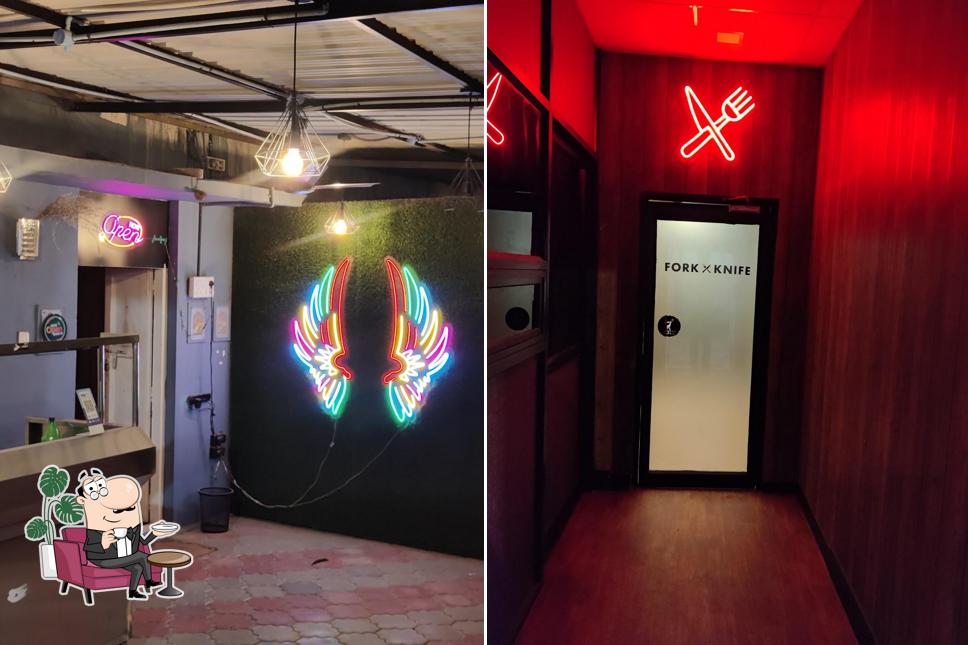 Take a look at the image displaying interior and food at FORK & KNIFE Restaurant