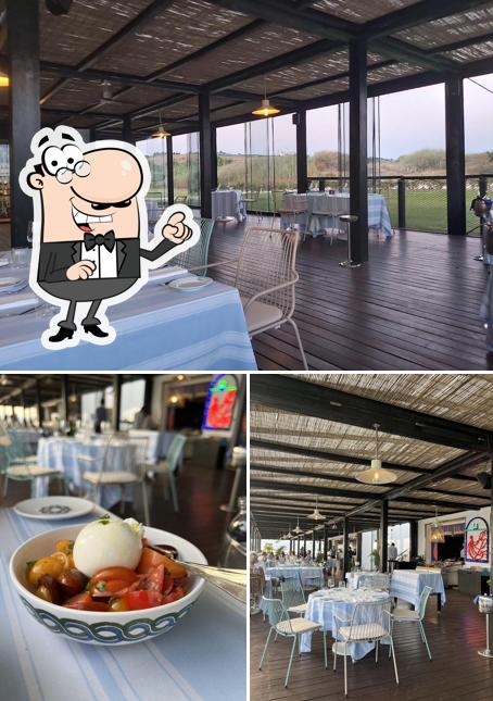 La interni e tavolo da pranzo del ristorante