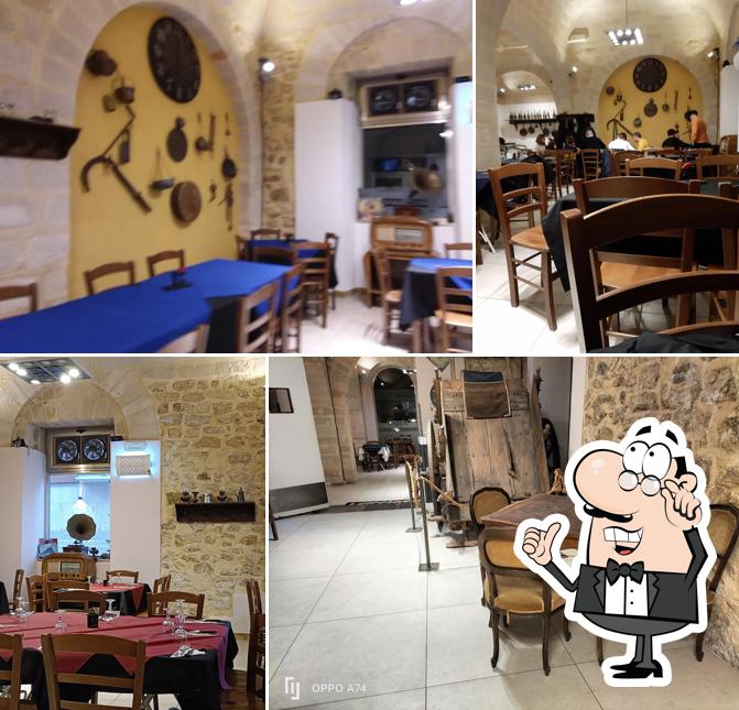 Siediti a un tavolo di I Picciotti Pizzeria Siciliana
