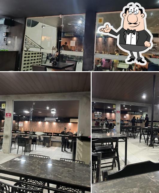 Sente em uma das mesas no Nippon Sushi & Culinária Japonesa em Morada do Sol, Teresina