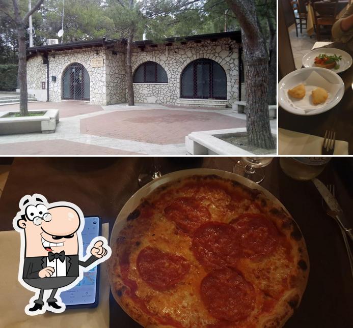 La immagine di interni e pizza da La Dimora Degli Elfi