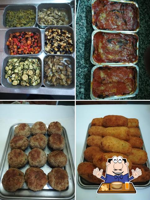 Platti al Pizzeria rosticceria Le Caricature