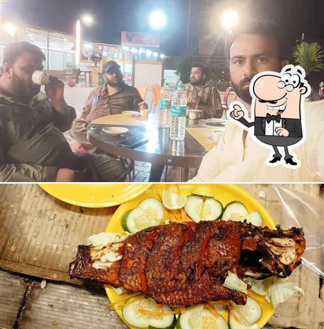 Take a seat at one of the tables at Jamis cafe