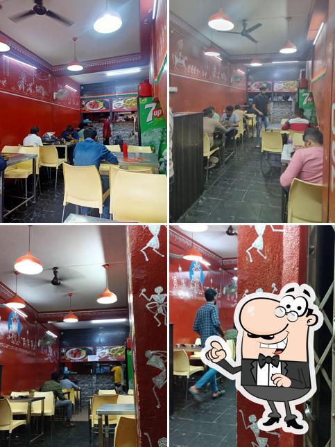 Take a seat at one of the tables at Aramane Donne Biriyani