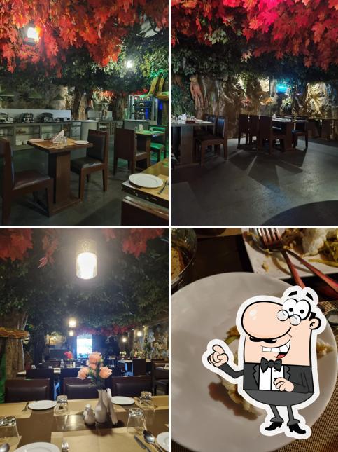 Take a seat at one of the tables at Cygnett Pavilion, Siliguri