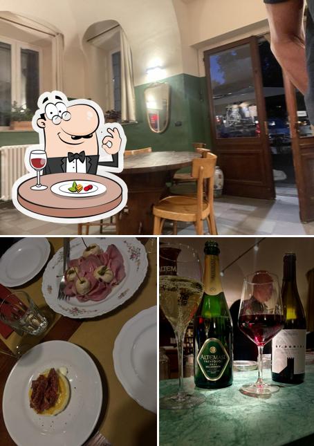 Questa è la immagine che presenta la cibo e interni di Panilli Vini e Cucina