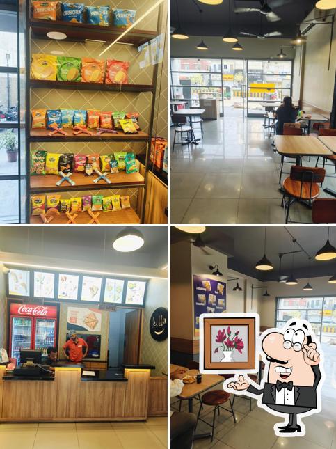 Take a seat at one of the tables at Two Slices