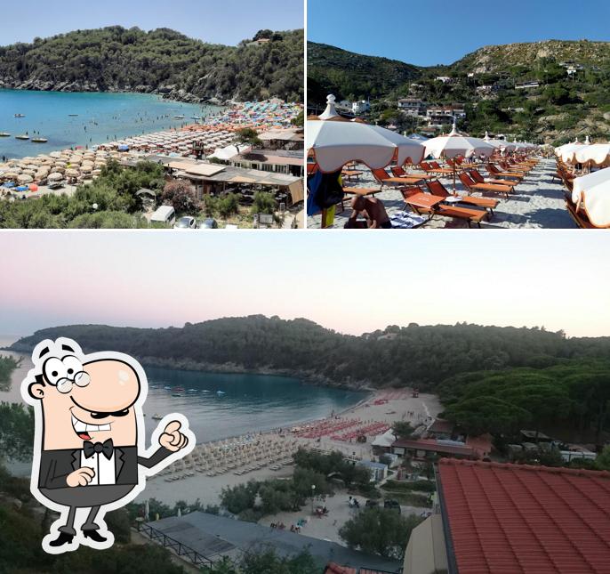 Puoi goderti l'aria fresca da seduto all'esterno di Hotel Alma