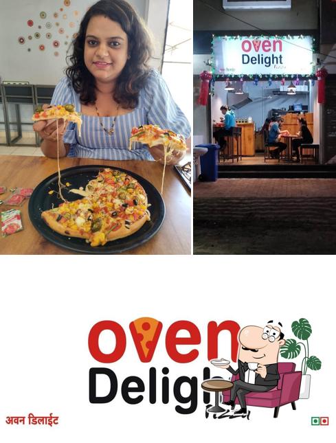 Take a seat at one of the tables at Oven Delight Pizza