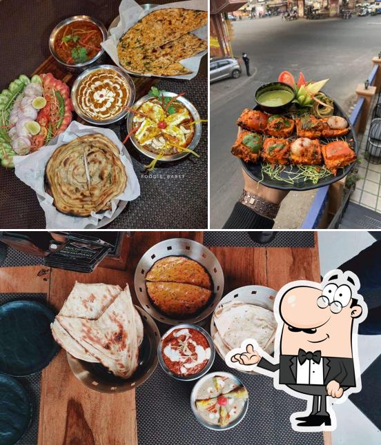 Take a seat at one of the tables at Desi Addicts