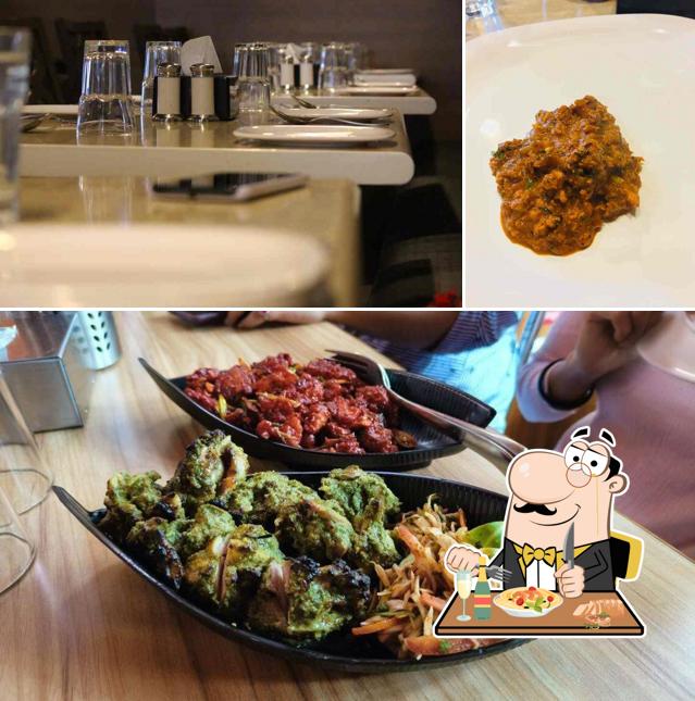 The image of food and dining table at MJ Tandoor