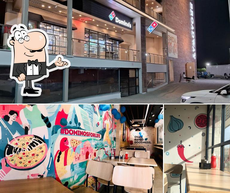 The photo of interior and exterior at DOMINOS