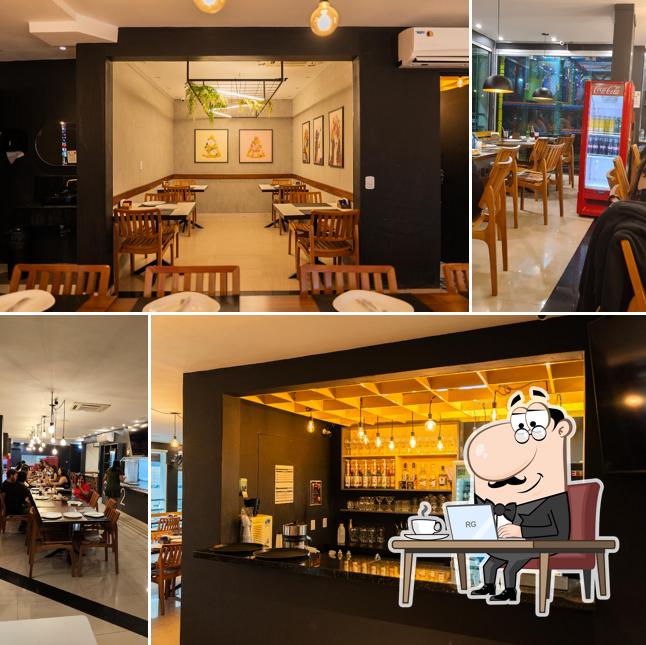 Sente em uma das mesas no À Lá Vontê Pizzaria - Guará