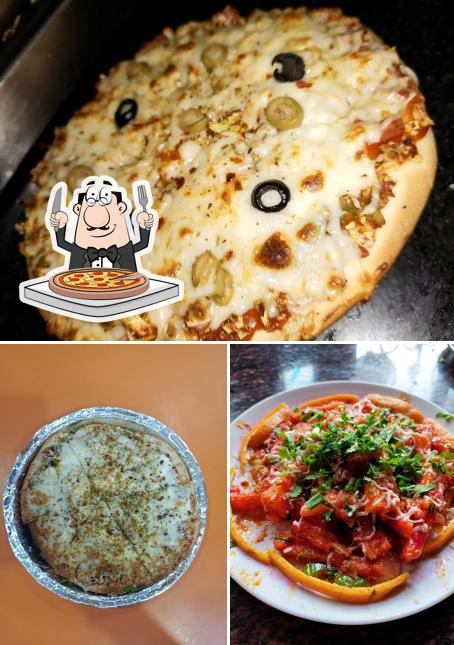 Try out pizza at Laxmi Pav Bhaji and Fast Food Corner